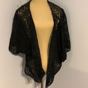 Black netted throw over